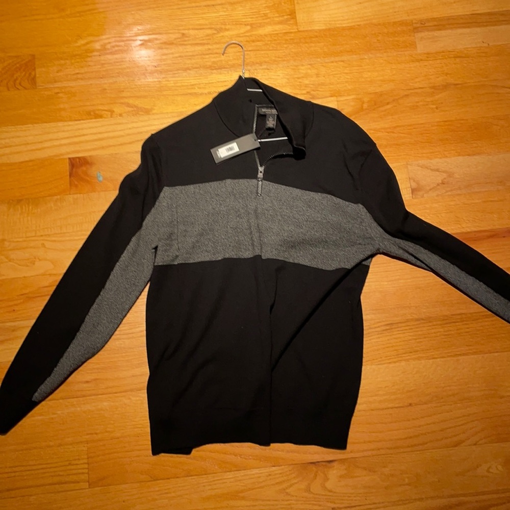 Never worn quarter zip. Tags still on.
